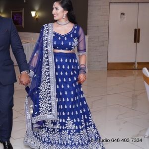Navy blue lengha Super heavy skirt and beautiful beading of gems all over